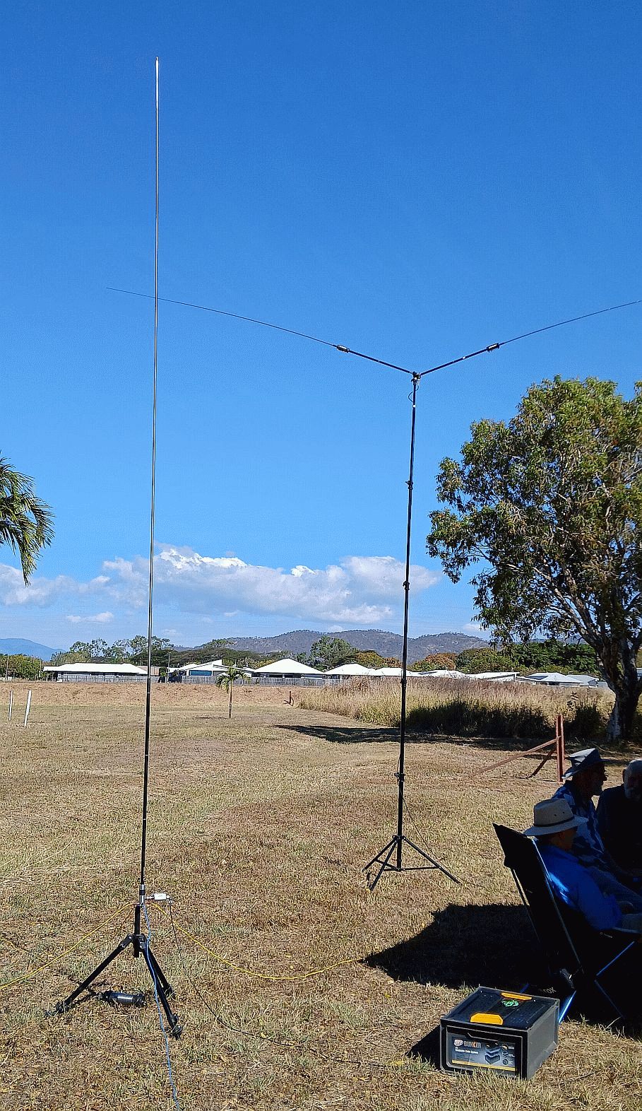 Two HF antenna masts set up in the field