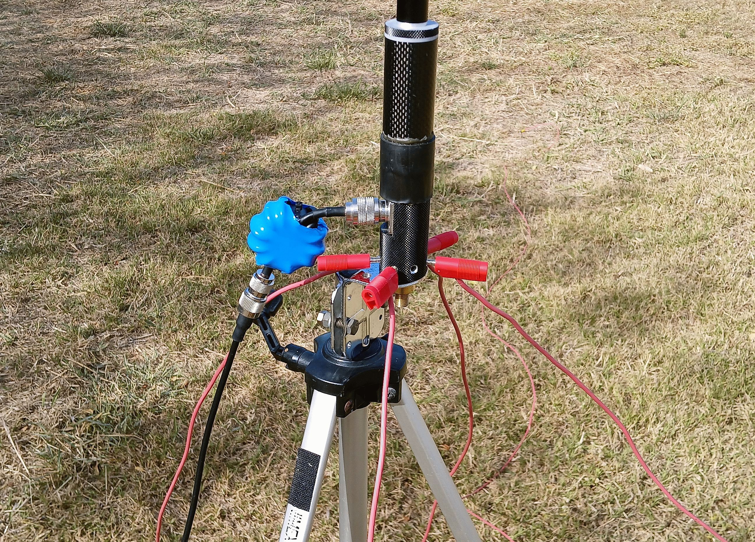 Antenna base with coax connections and tripod mount