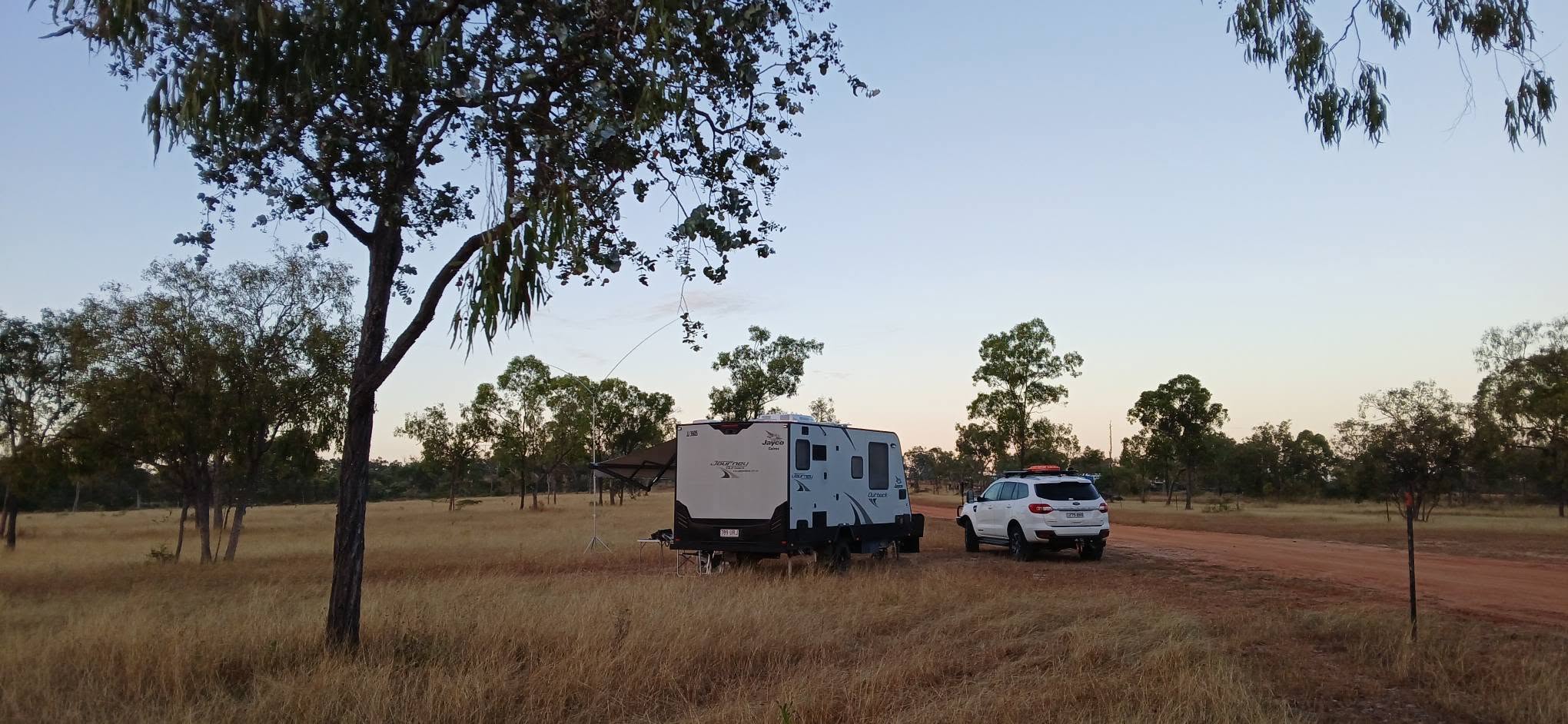 Caravan and ute at dusk