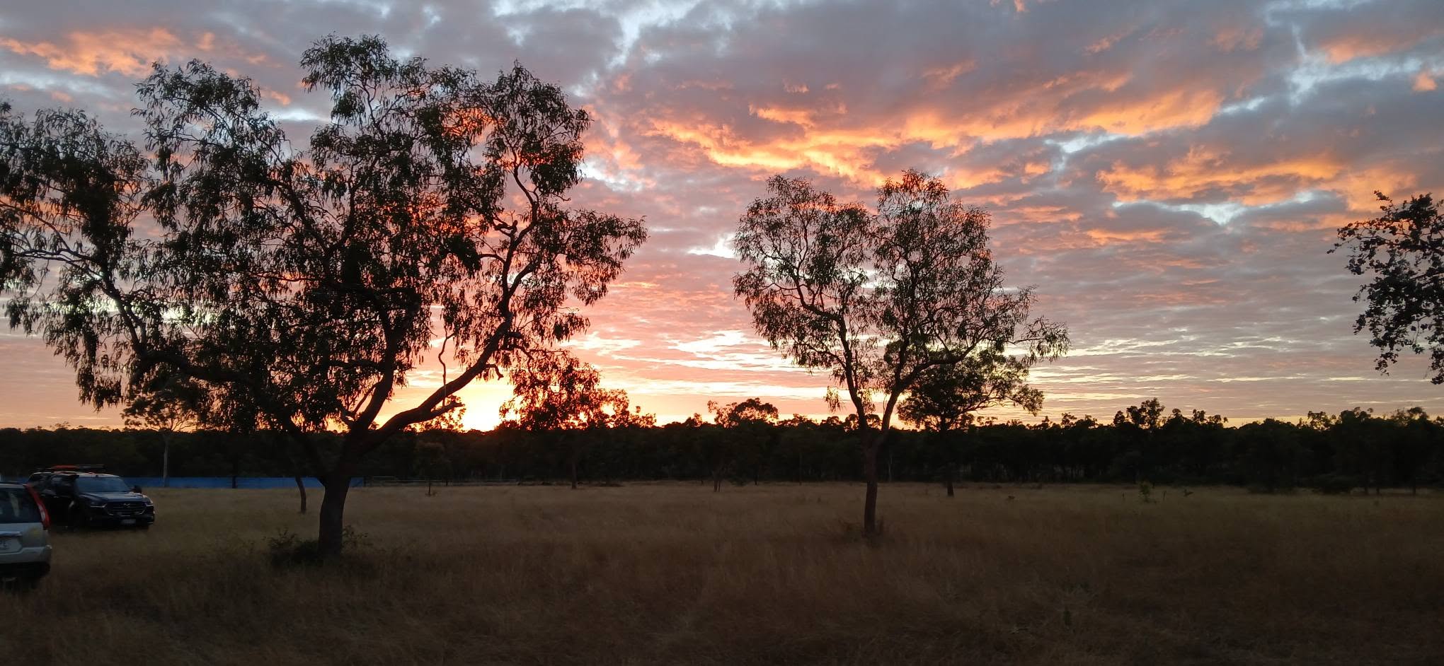 Sunset silhouette over the campsite