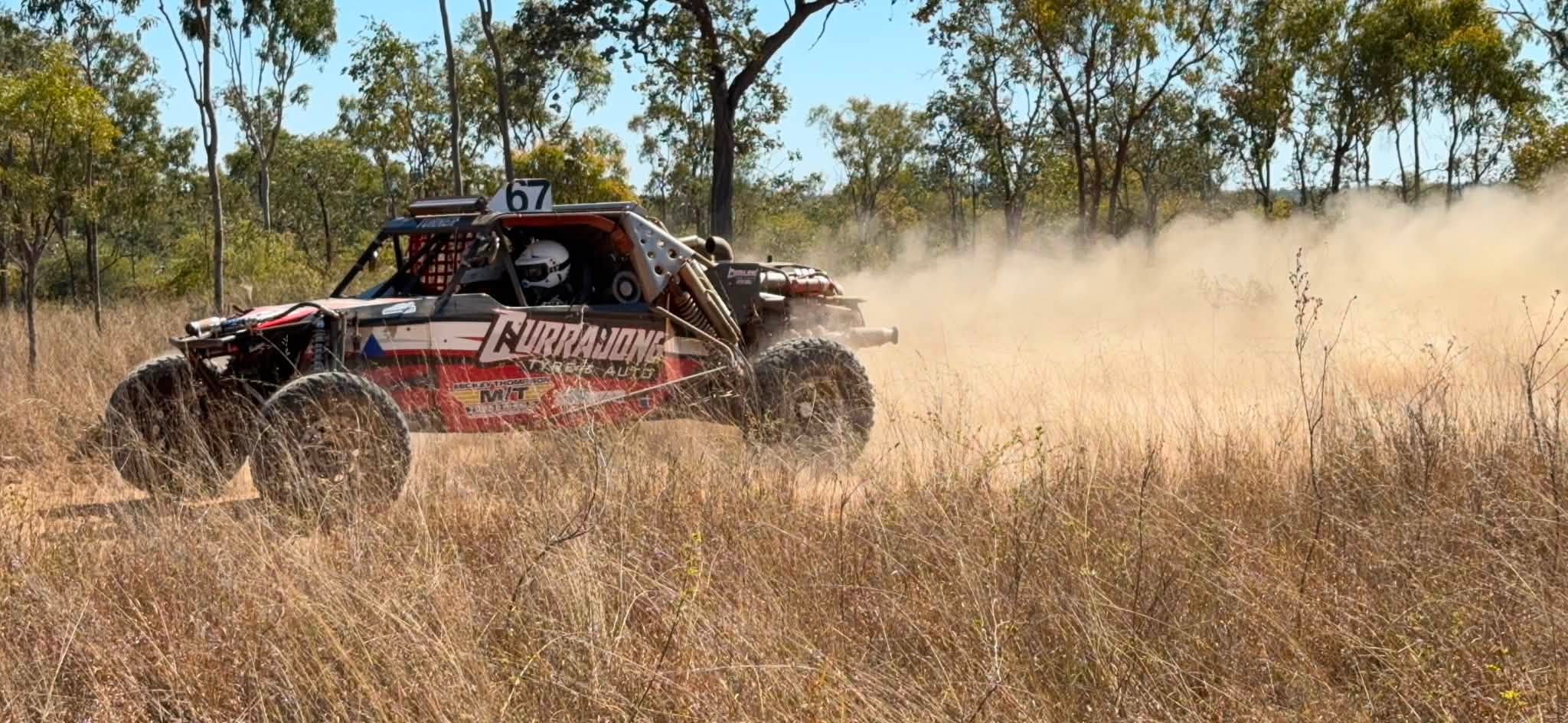Race car 67 Currajong Tyres and Auto kicking up dust