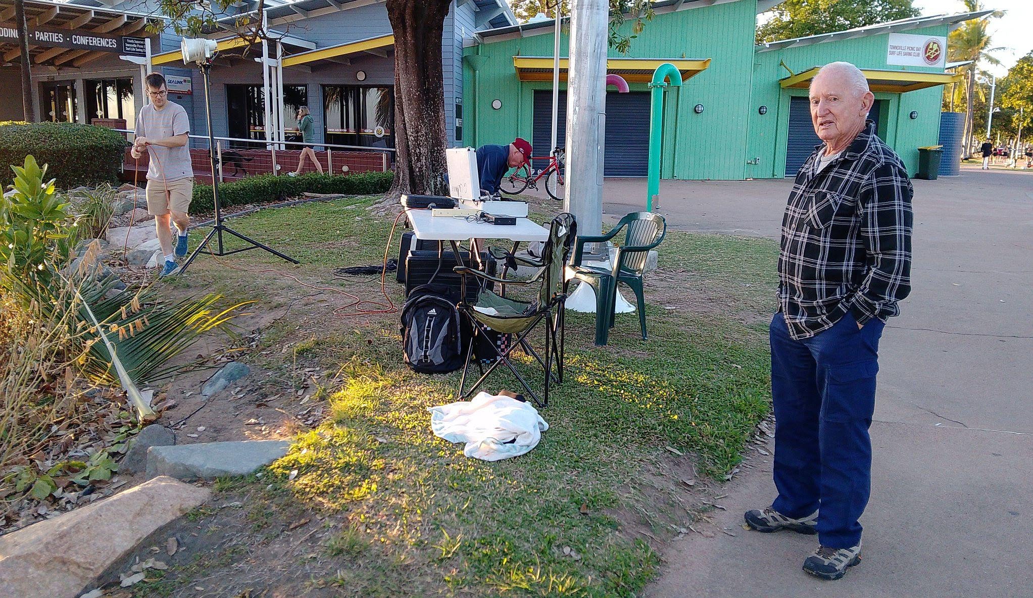 Setting up the communications table near the Gregory Street Headland at sunrise