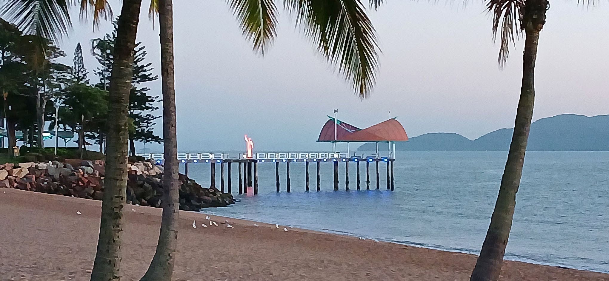 Dawn over the Strand rockpool and jetty, with Magnetic Island in the distance