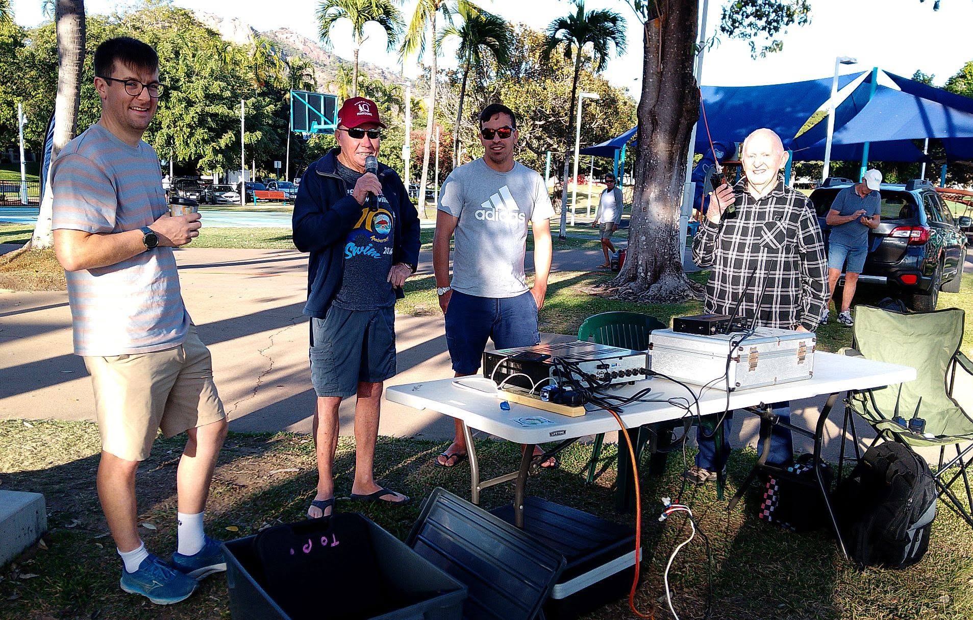 Ashley on the PA microphone at the headland base with the officials team