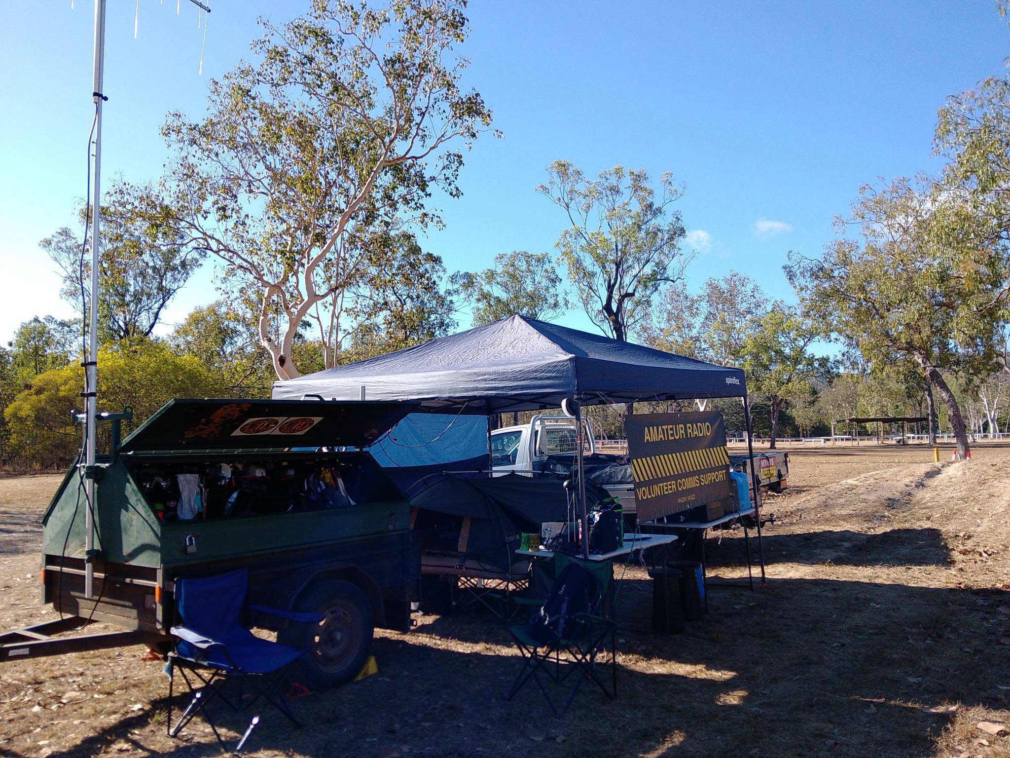 Amateur Radio Volunteer Comms Support trailer and gazebo set up at the ride grounds