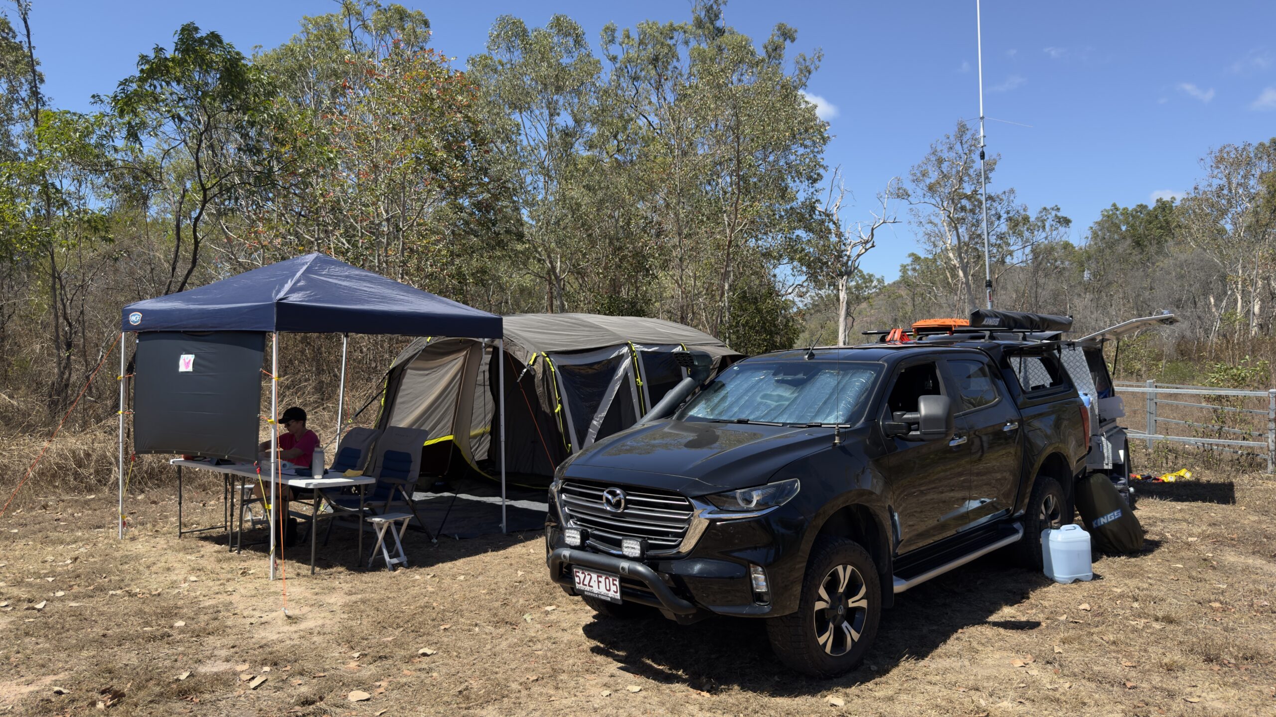 Checkpoint camp with a gazebo, tent, 4WD and antenna mast
